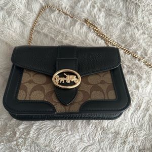 Small two tone Coach night bag with gold chain.  Brand new/never used.